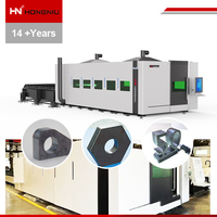 Table d'échange hydraulique robuste HN-6025GA entièrement fermée pour découpe laser CNC à fibre grand format avec dispositif de serrage hydraulique