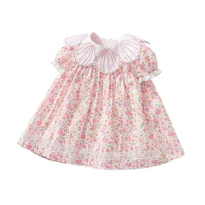 Factory direct supplier fashionable pink ruffled plain girls smock flower dress baby handmade embroidery princess dress