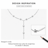 Collier Lariat en Acier Inoxydable avec Breloques Fleur, Plaqué Rhodium, Design Minimaliste pour un Port Quotidien