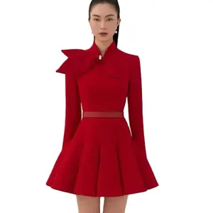 Bettergirl En stock Vietnam designer niche bouffée jupe courte rouge arc décolleté laine robe Nouvel An bataille robe