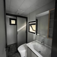 Cabine d'hôtel capsule multifonctionnelle en forme de pomme, expérience de camping orientée, mini cabine mobile préfabriquée modulaire en forme de pomme