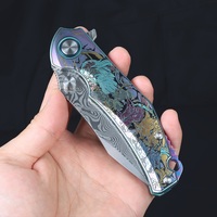 Couteau pliant en acier Damas coloré RWL34 et PMC27 avec motif de dragon fait à la main, outil de survie en plein air de poche