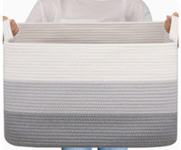 Panier de rangement tissé de grande capacité avec poignée, pratique pour le déménagement et l'organisation.