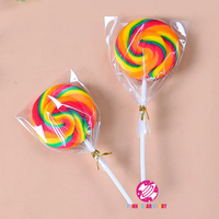 Sucette de confiserie en vrac personnalisée pour enfants Snack Rainbow Swirl Pops Bonbons durs Saveur de fruits sucrés Forme ronde Sucette plate