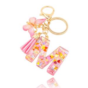 2025 vente chaude à la mode rose coeur paillettes papillon gland cristal goutte colle pendentif femmes résine lettre porte-clés - Product Image 1