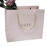 Bolsa de Papel de Alta Calidad con Asas de Cuerda y Logotipo en Lámina Dorada Personalizada para Compras