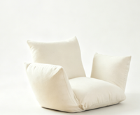 Canapé paresseux tout-en-un, avec coussin moelleux attrayant et bien fait, dossier et assise pliables de style japonais minimaliste.