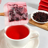 Thé de Roselle en fleurs entières en sachet visible, goût acidulé et fruité, infusion rubis intense, bien-être quotidien, étiquette personnalisée, directement de l'usine