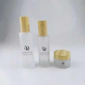 March Expo Popular Cosmetic Packaging Glass Lotion Bottle 50g Cream Jar With Bamboo Lid