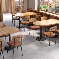 Ensemble de table et de chaises de salle à manger en bois et cuir PU, moderne et luxueux, personnalisé pour villa et restaurant