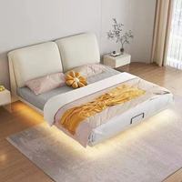 Minimalistisches Weißes Schwebendes Bett aus Weichleder mit Bewegungssensor-LED-Beleuchtung Modernes Gepolstertes Bettgestell für Hauptschlafzimmer