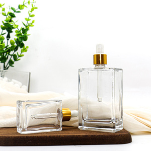 Tại Chỗ Phẳng Vuông Hình Chữ Nhật Sang Trọng <span class=keywords><strong>15Ml</strong></span> <span class=keywords><strong>30Ml</strong></span> 50Ml 100Ml Chai Thủy Tinh Nhỏ Giọt Với Cổ Áo Vàng Cho Huyết Thanh Tinh Dầu - Product Image 6