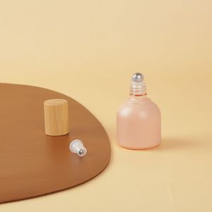 10ml Morandi Couleur Verre Roll on Bottle avec Perle En Acier Inoxydable et Couvercle En Bois <span class=keywords><strong>De</strong></span> Bambou pour <span class=keywords><strong>Parfum</strong></span> Huiles Essentielles Roller Bottle - Product Image 3