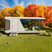 Maison conteneur capsule spatiale au design moderne pour hôtels et immeubles de bureaux