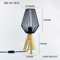 Lampe de table LED créative en métal noir de style nordique minimaliste moderne pour la décoration de chevet de chambre à coucher