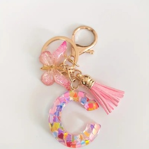 2024 qua biên giới tại chỗ màu hồng sequin nhựa PVC bướm tua Keychain Mặt dây chuyền 26 chữ cái tiếng Anh phim hoạt hình phong cách vật liệu nhựa - Product Image 5