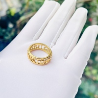 Prix de gros AB 2026 Nouveau style Bague ours ajourée large tressée pour femme en acier inoxydable