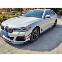 Kit de carrosserie amélioré de style AD en fibre de carbone sèche, comprenant une lèvre avant, des jupes latérales, un diffuseur arrière, un aileron arrière et des éléments décoratifs de garde-boue, pour BMW G30 G38
