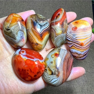 Vente en gros de pierres de paume en agate onyx naturelle, décoration d'intérieur et cadeaux de fête, pierre d'inquiétude naturelle, agate rayée naturelle - Product Image 1