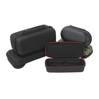 Estuche Protector de EVA OEM ODM con Ribete en Contraste Negro y Rojo, Organizador con Bolsillo Externo con Cremallera, Asa de Transporte y Correa para la Muñeca