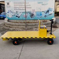 Chariot de transport électrique à plateforme plate à quatre roues, robuste, capacité de charge 1000 kg, en acier inoxydable, personnalisable OEM