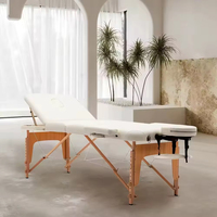 Table de massage thaïlandaise professionnelle pliable et réglable, en bois et cuir noir, très vendue