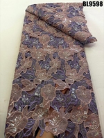 Prix de gros Tissu de dentelle de luxe perlé brodé en tulle avec sequins pour robes de mariée des Philippines
