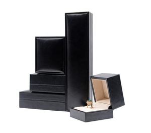 Hình chữ nhật màu đen thanh lịch PU da đồ trang sức Set <span class=keywords><strong>Box</strong></span> với biểu tượng tùy chỉnh bao bì hiển thị cho vòng đeo tay nhẫn dây chuyền - Product Image 1