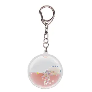 粉红色液体钥匙扣与可爱的海豚漂浮物内部3D漂浮物钥匙扣