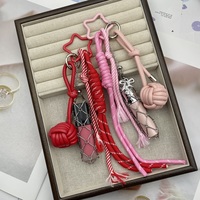 Pendentif en corde tressée tendance, porte-clés innovant en acier inoxydable, sac à rouge à lèvres en maille, petit pendentif boule, vente en gros