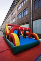 Parc de jeux gonflables commercial géant avec toboggans aquatiques et châteaux gonflables en promotion