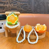 Realistische gepelde sinaasappel fruit sleutelhanger met parelketting, schattig voedselvormig tasbedeltje voor vrouwen, cadeau accessoires