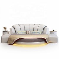 Lit d'hôtel rond moderne King Size avec design modulaire, revêtement en cuir PU, éclairage LED intégré et cadre en bois