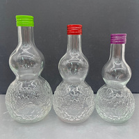 Nouvelle conception de bouteille en verre en forme de gourde de 270 ml, 380 ml, 500 ml avec bouchon anti-effraction en aluminium coloré pour le stockage de jus, de fruits et de liqueurs
