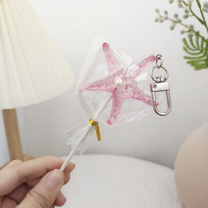 Buena calidad Lidao Pvc estrella de mar <span class=keywords><strong>novela</strong></span> llavero personalidad estudiante bolsa piruleta sirena bar adornos colgantes al por mayor - Product Image 6