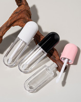 EN STOCK SANS MOQ Tube vide transparent en forme de capsule ovale de 4 ml pour brillant à lèvres avec applicateur en silicone