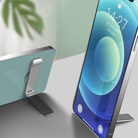 Soporte Plegable Adhesivo para Teléfono, de Aleación de Zinc, Ángulo Ajustable, Portátil para Escritorio, Oficina y Viajes, Directo de Fábrica
