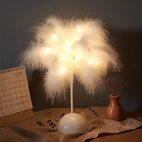 Lampe de table LED moderne avec design plume, en ABS, pour décoration de chambre, rechargeable par USB, batterie incluse, taille moyenne