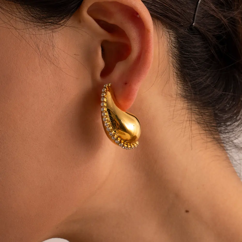 Moda 18K chapado en oro joyería grueso lágrima pendientes diamante pendientes con incrustaciones de circón lágrima hueco pendientes mujeres