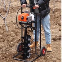 La perceuse à essence à quatre temps de 5,5 kW à main est utilisée pour planter des arbres et creuser des trous dans les jardins