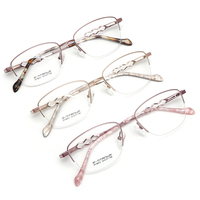 Marcos ópticos de titanio para mujer, nuevo diseño, gafas personalizadas, fabricante
