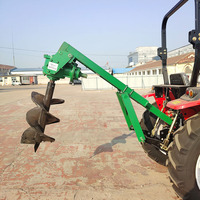 Machine à tarière spirale montée sur tracteur pour sols durs et congelés, pour la plantation d'arbres et le forage de trous pour poteaux