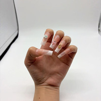 Vente directe d'usine de kits de nail art DIY 144 pièces avec différents styles et faux ongles ABS de haute qualité.
