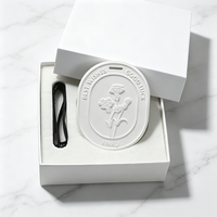 Diffuseur d'huile essentielle de fleur de porcelaine de parfum de plâtre d'arôme de maison de garde-robe de voiture de garde-robe en céramique parfumée stockée