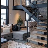 Escalier droit à une seule poutre de luxe pour résidence haut de gamme avec balustrade en verre sans cadre