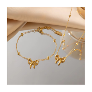 Collier Perles et Breloques Nœud Fin Bijoux de Mode Étanche pour Femme Cadeau Ensemble Bijoux Plaqué Or Nœud Papillon Bracelet Boucles d'Oreilles - Product Image 1