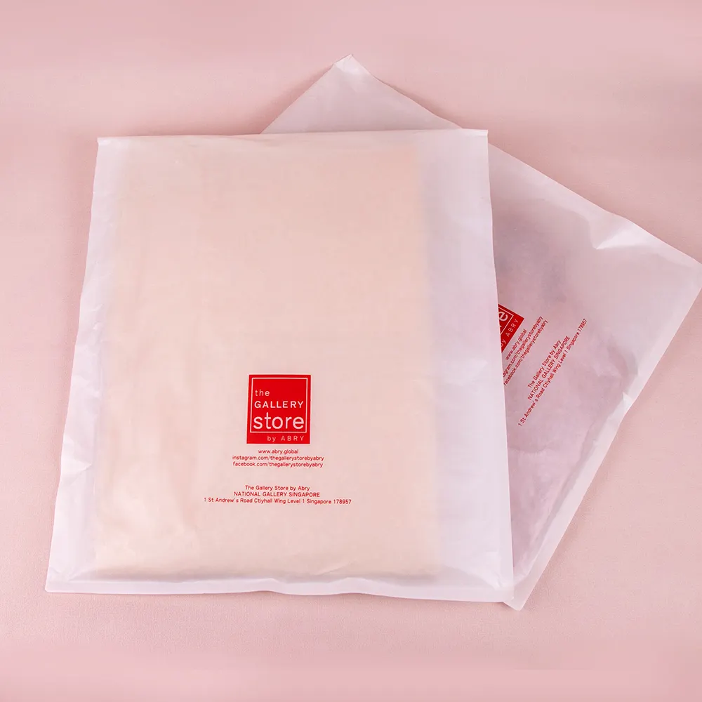 カスタムロゴペーパーバッグ環境にやさしい粘着バッグワックスコーティングされた衣類衣服包装バッグ生分解性