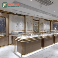 Vitrine à bijoux haut de gamme haute visibilité, surface polie, pour magasin de marque