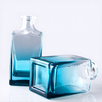 Bouteille en verre colorée dégradée personnalisée par le fabricant pour le vin, le whisky, les spiritueux, les boissons, le diffuseur, l'emballage