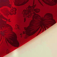 Le dernier tissu tissé floral de papillon rouge de tissu de jacquard de satin peut être employé pour la robe/robe somalienne de Dirac